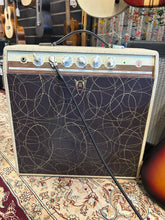 Load image into Gallery viewer, Vintage guitar amplifier with intricate design on a patterned rug